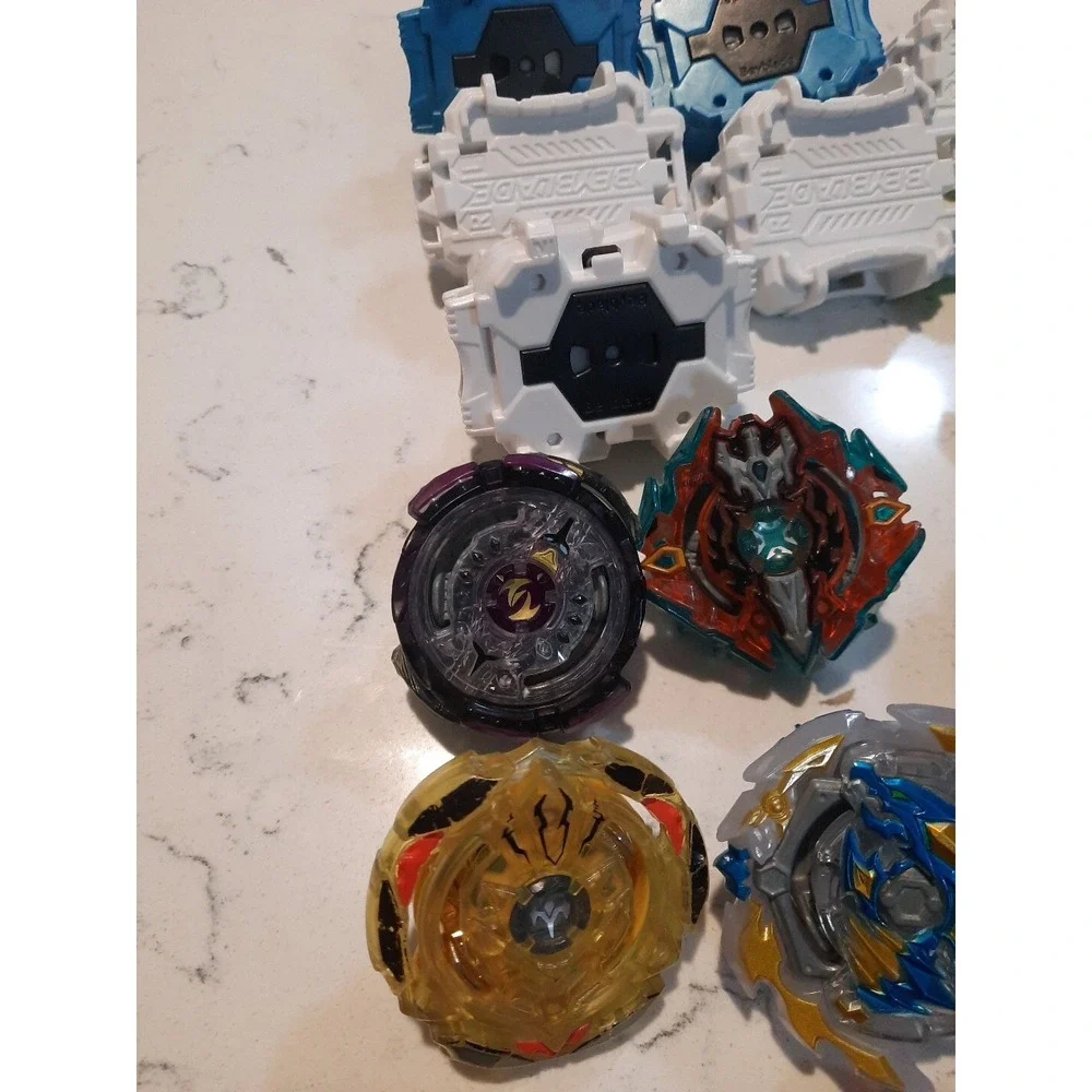 Lot Of 8 Beyblade And Different Parts